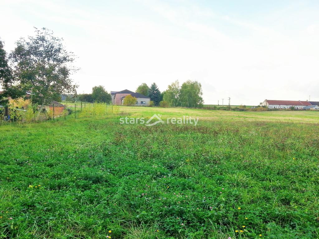 Prodej pozemku na výstavbu  RD o výměře 4660 m2 v obci Buštěhrad
