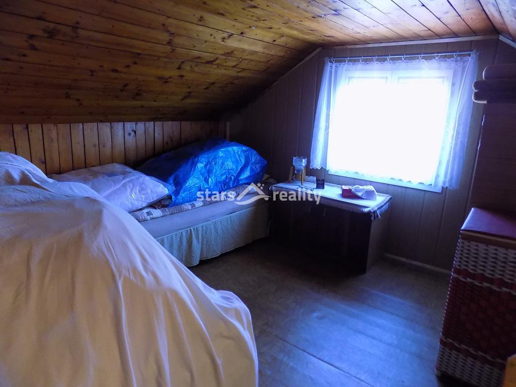 Prodej chaty v chatové osadě, obec Káraný