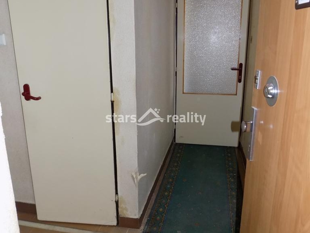 Prodej bytu 3+1/L, 61 m2, s garáží, Praha - Hostivař